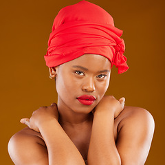 Image showing Young beauty, wrap and portrait with scarf, red lipstick and girl wellness in studio. Yellow background, female person and self care cosmetics with model and makeup for skincare and facial glow