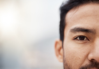 Image showing Human, eye and closeup portrait of man with mockup, background for advertising space or banner of Asian person Serious face and vision or focus for wellness, health and thinking of future in care
