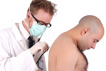 Image showing funny doctor checking a patient 
