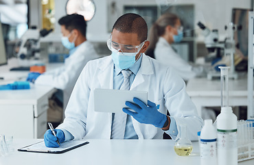 Image showing Face mask man, tablet or writing in science laboratory for medical virus research, medicine or vaccine development. African scientist, technology or clipboard paper for healthcare and disease control