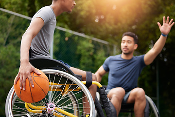 Image showing Sports game, wheelchair basketball player and people playing match competition, challenge or practice skills. Outdoor action, opponent and fitness athlete with disability, training and exercise