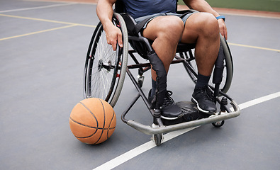 Image showing Wheelchair, sports and man with basketball at outdoor court for fitness, training and cardio. Exercise, closeup and person with disability at a park for game, workout and weekend fun or active match