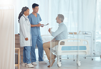 Image showing Doctors, nurse and healthcare people consulting, advice or consultation with patient on medical checkup, exam or health services. Surgeon, assessment and clinic staff support, wellness or medicare