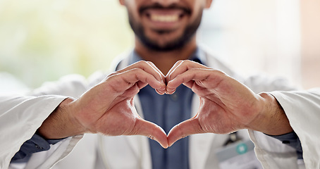 Image showing Medical, wellness and doctor heart hands for love, support and healthcare in a hospital or clinic by medicine professional. Trust, hope and worker with bright sign, symbol or gesture for cardiology