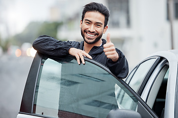 Image showing New car, man with thumbs up and smile on street, yes and thank you for vehicle finance loan success. Winning, motor deal and happy driver in city for travel, transport and auto insurance agreement.