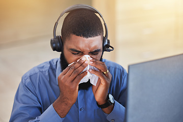 Image showing Sick, man and blow nose in call center office for flu, allergies, and health risk in telemarketing agency. Face of african salesman, CRM agent and tissue for virus, bacteria and sneeze for allergy