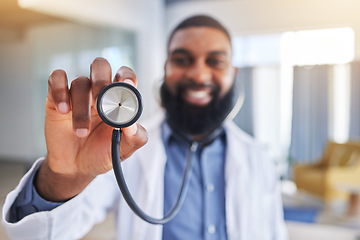 Image showing Doctor, man and hands with stethoscope for heartbeat, healthcare services and cardiology. Closeup of happy medical worker with listening tools to check heart, lungs and breathing test in hospital