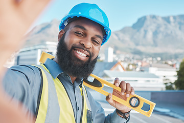 Image showing Construction, worker and selfie portrait of man in city for building project, labor and civil engineering. Face of happy african architect, photograph and ruler for property development in Cape Town