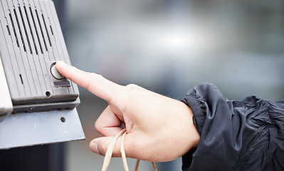 Image showing Finger, button and intercom with a person closeup outdoor for entrance through a security communication system. Hand, office building or press with an adult in the city for access via a buzzer