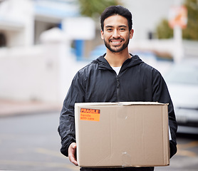 Image showing Delivery man, box and courier service for distribution, logistics and retail supply chain in outdoor portrait. E commerce, cardboard package and product, city shipping and happy face of stock worker