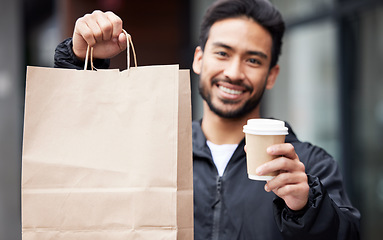 Image showing Breakfast delivery, portrait and a man with a coffee, food or ecommerce service from a restaurant. Happy, commercial and an Asian worker with lunch or dinner from a courier from a cafe in the morning