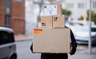 Image showing Person, boxes and delivery or courier service for online shopping, logistics or supply chain management outdoor. E commerce, cardboard package and product for urban city shipping and stock worker