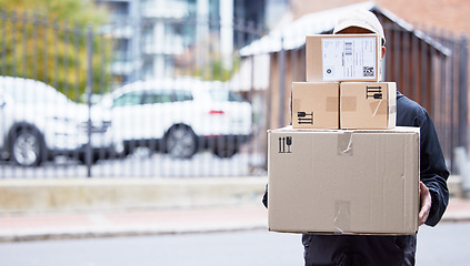 Image showing Courier person, street and walking with boxes, service and delivery in urban city for supply chain job. Logistics worker, package and road for customer satisfaction, product and commerce in metro cbd