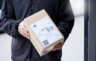 Image showing Box, hands and courier at entrance for a delivery, ecommerce work or cargo shipping. Closeup, logistics and man or person with a package, stock or front door freight wholesale or distribution service