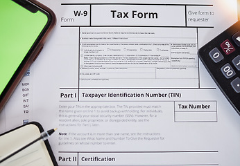 Image showing Tax paperwork, closeup and finance with accounting, form for income information, audit and contract. Financial paper, money and taxes with government documents, salary and revenue with calculator