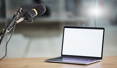 Image showing Laptop screen, mockup and microphone, radio or podcast with audio equipment, technology and marketing for show. Multimedia, communication and email with website design layout, news and about us on pc