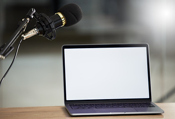 Image showing Microphone, laptop mockup and screen with audio, radio or podcast equipment with technology and show marketing. Multimedia, communication and email with website design layout, news and about us on pc