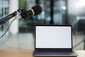 Image showing Laptop screen, mockup and microphone, audio equipment for radio or podcast with technology and advertising. Multimedia, communication and email with website design layout, news and about us on pc