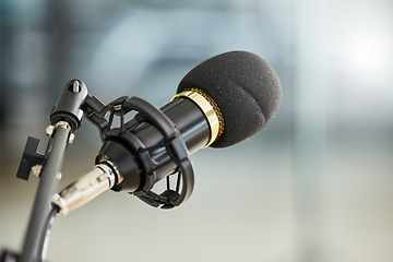 Image showing Background, closeup and microphone for podcast, radio interview and audio in recording studio. Sound gear, voice over production and broadcast of talk show, live stream communication and music media