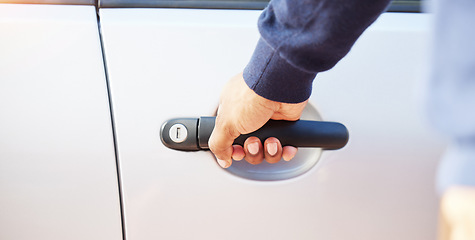 Image showing Hand, handle and outdoor for car door, open and ready for drive, travel or transportation on street. Person, chauffeur or transport employee with vehicle for journey, driving or road trip adventure