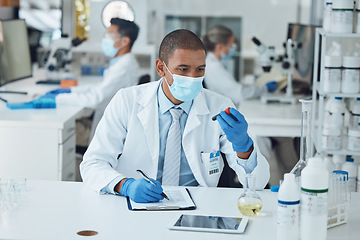 Image showing Science, writing and man with blood work for doctor research and study in clinic. Lab expert, data analysis and healthcare professional with innovation and notes for covid test of dna scientist