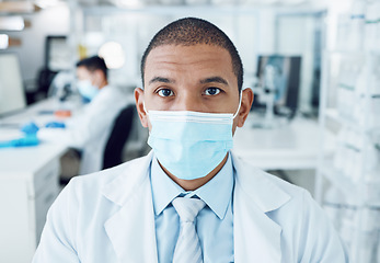 Image showing Portrait, mask and man in a laboratory, research and career with covid protection, medical and safety. Face cover, person and researcher with compliance, lab and scientist with serious professional