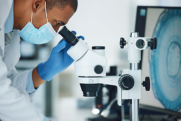 Image showing Microscope, science and man with mask on face in laboratory to review particles, medical test and biotechnology. Scientist, microbiology and investigation of innovation, dna analysis and development