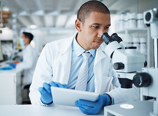 Image showing Microscope analysis, man and laboratory scientist working on healthcare research, pharma project or test sample. Science experiment, tablet and person typing results of hospital check, study or exam