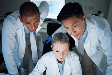 Image showing Scientist group, thinking together and analysis in laboratory, night and teamwork for innovation, diversity and overtime. Men, leader and woman in science team, brainstorming and ideas in dark lab