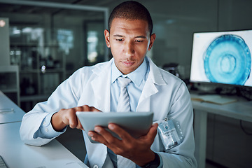 Image showing Man, night or tablet in science laboratory for medical research, deadline or pharmacy wellness. African scientist, person or working late on digital technology, DNA healthcare or genetic engineering