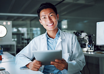 Image showing Tablet, portrait and scientist with digital innovation, data and smile in laboratory. Asian man, doctor and information technology for futuristic medical research with online pharma healthcare study