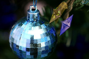 Image showing Christmas ornaments on tree.