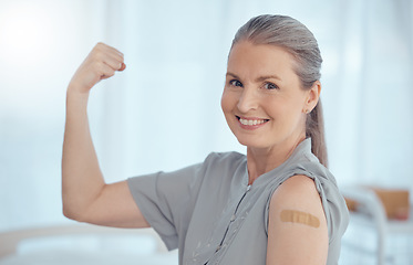 Image showing Strong, portrait and a woman with a plaster from a vaccine, healthcare and safety from virus. Happy, muscle and an elderly or senior hospital patient with medical insurance, motivation or vaccination