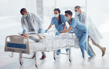 Image showing Doctors, team and hurry with bed in hospital for medical emergency, surgery operation and first aid help. Healthcare group running fast in rush, motion blur and urgent patient assessment in clinic