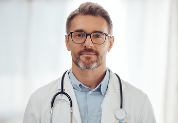 Image showing Doctor, senior man and portrait with health and physician at hospital, stethoscope and cardiology surgeon. Professional headshot of male person, expert in medical and cardiovascular healthcare