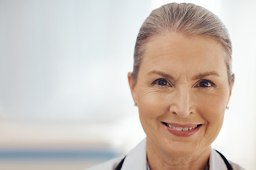 Image showing Happy, space and doctor with portrait of woman in hospital for medicine, surgery and future. Healthcare, expert and therapist with face of mature person in clinic for smile, medical and mockup