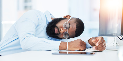 Image showing Sleeping, burnout and tired businessman in office overwhelmed by deadlines with fatigue at desk. Lazy worker, depressed consultant or exhausted black man resting or taking nap in overtime with stress