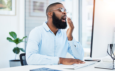 Image showing Yawn, tired employee and black man at desk, burnout and agent with startup company, feeling exhausted and computer. Fatigue, early morning and consultant working on pc with overtime, tech and sleepy