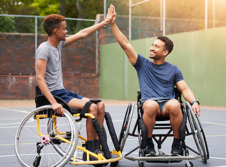 Image showing Sports, wheelchair basketball court and happy people high five, celebrate success and smile for match competition win. Player celebration, winner and athlete with disability excited for achievement