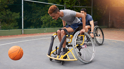 Image showing Sports, basketball and men in wheelchair for exercise, training and workout on outdoor court. Fitness, team and male people with disability tackle ball for playing competition, practice and games