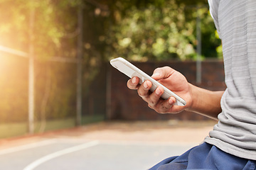 Image showing Smartphone in hand, person outdoor and typing, social media scroll and communication with mobile app. Using phone while at sports playground, texting and online chat with contact and technology