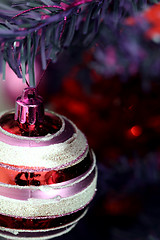Image showing Christmas ornaments on tree.