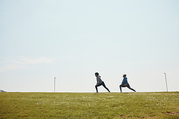 Image showing People stretching, fitness and start run outdoor, flexibility and training for marathon with mockup space. Runner team in park, exercise and race warm up, sports and athlete, health and wellness