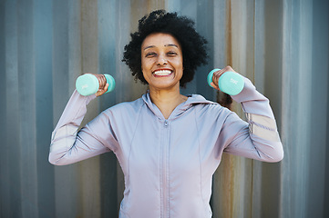 Image showing Mature woman, happy in portrait and fitness with dumbbells, strong and muscle training. Female person with smile, exercise equipment and happiness with bodybuilding and weights, power and excited