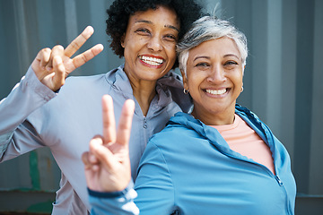 Image showing Fitness, peace sign and portrait of senior women bonding and posing after a workout or exercise together. Happy, smile and elderly female friends or athletes with hipster hand gesture after training.