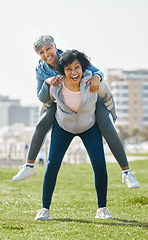 Image showing City, funny and senior women piggyback together playing, crazy and funny with as friends for outdoor exercise. Health, wellness and portrait of crazy elderly people bonding and laughing after workout