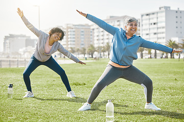 Image showing Women, senior and stretching in park, fitness and wellness with flexibility and start workout outdoor. Female people, friends with pilates or running in nature, training and exercise with vitality