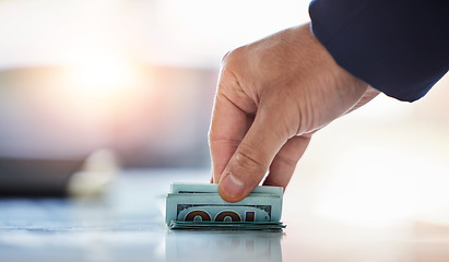 Image showing Hands of man with cash, notes and dollars in on desk in trade office with profit, bonus deal and financial growth. Money stack, bills and banking, payment and financial budget investment opportunity.