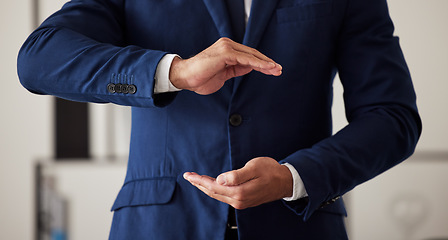 Image showing Hands, finance and a business man in the office closeup to offer cover for security or safety. Insurance, support and hand gesture with a male employee working in an investment agency for protection