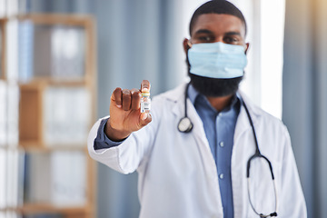 Image showing Healthcare, liquid and doctor portrait with vaccine, medicine or medical drugs in hospital. Clinic, African male professional and container for injection, virus prevention and medication for disease